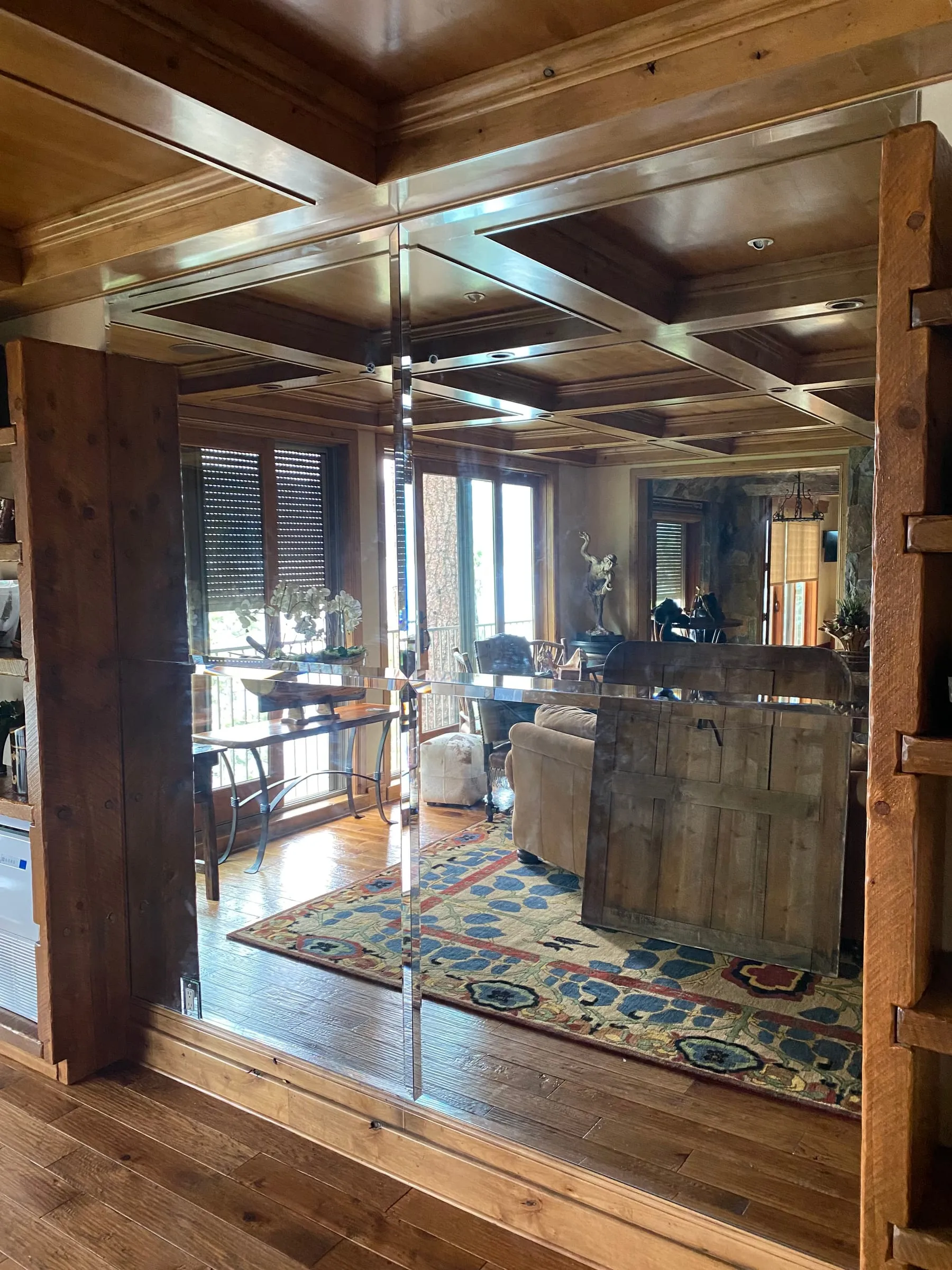 Glass panels set in wood framing to open up a den